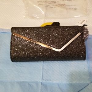 Glitter clutch by Fiomi